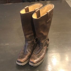 Frye brown leather boots with lug soles.